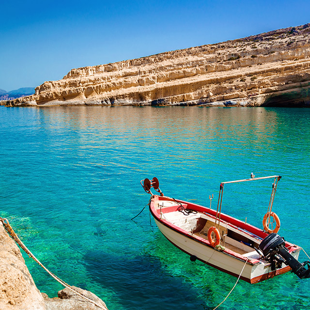Greece-crete-matala-caves-boat.jpg