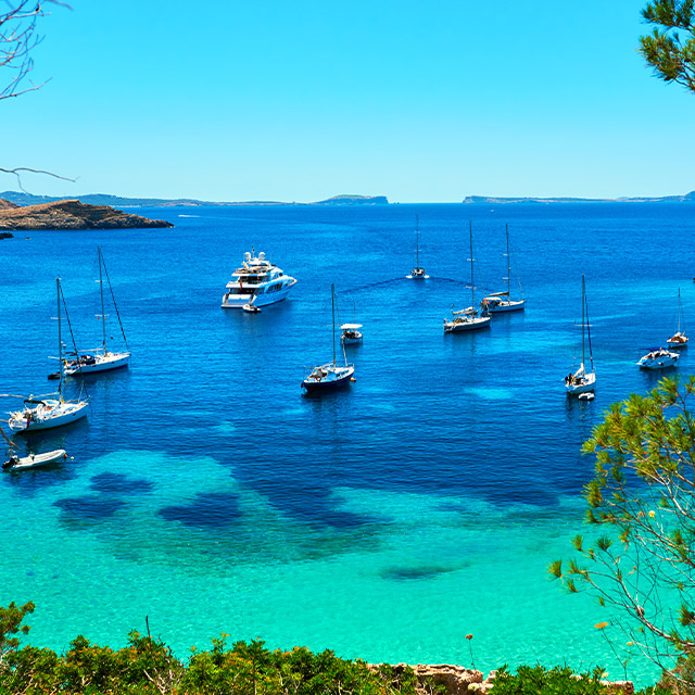 Spain-Ibiza-Cala-Salada-bay-boat.jpg